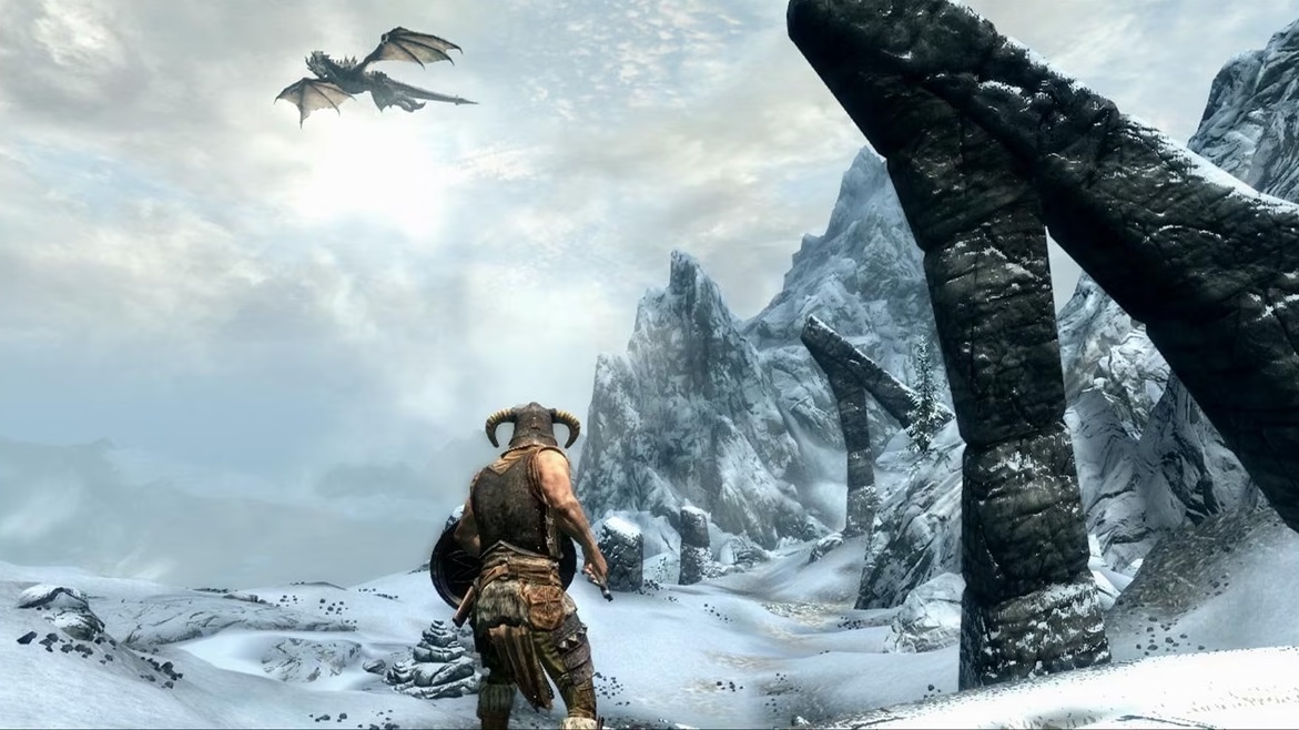 A warrior faces a dragon in the snow.
