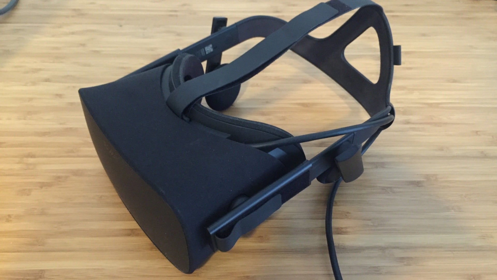 The finished consumer version of the Oculus Rift. Note the adjustable, built-in headphones.