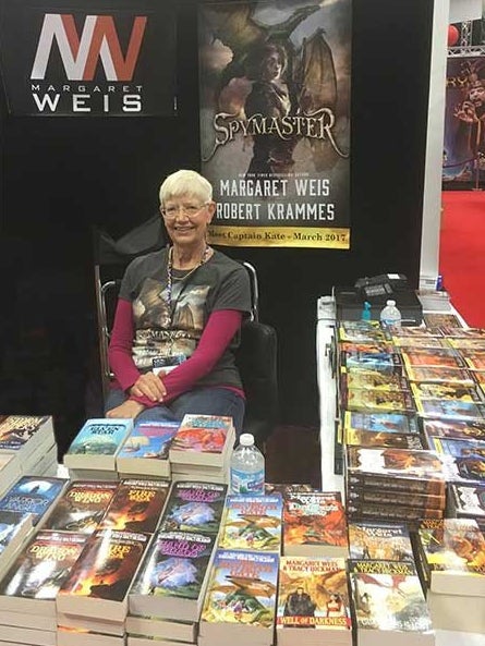 Margaret Weis selling her books at GenCon