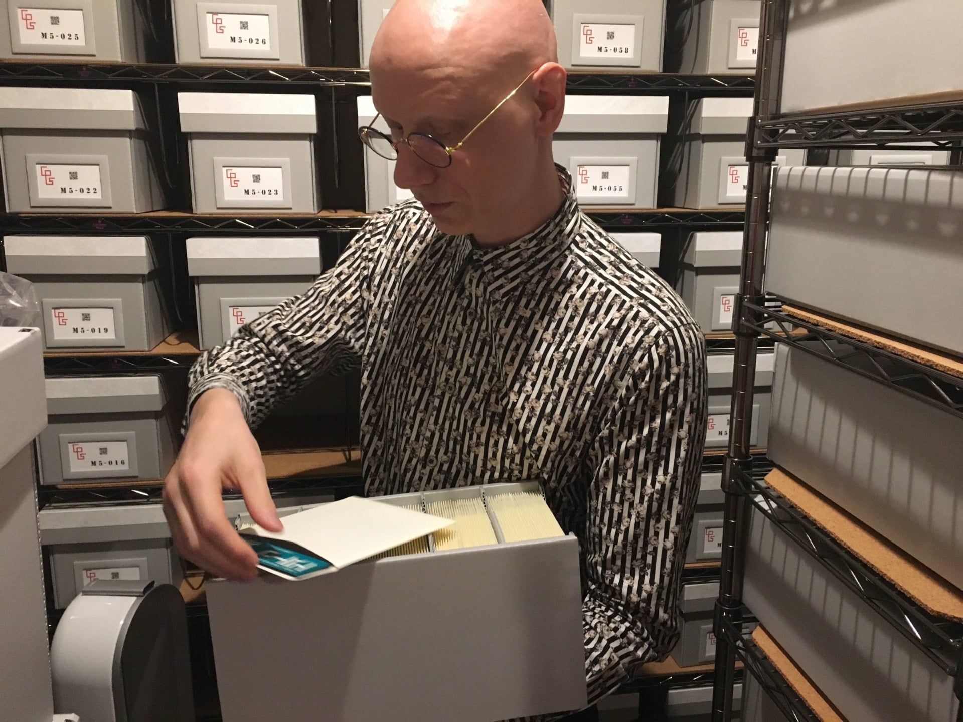 Each element of a game is tagged with a QR code and stored separately in acid-free, specially-designed envelopes and boxes.