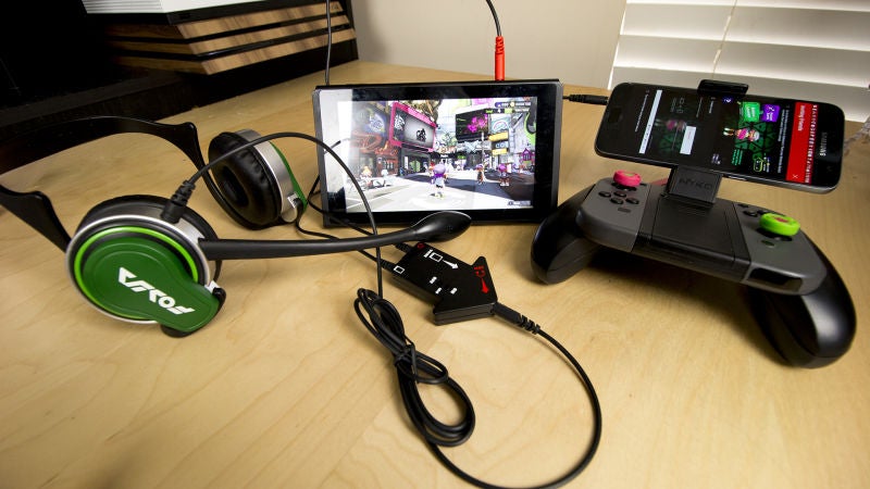 The licensed Hori Splatoon 2 chat rig, which is more or less what you need if you want to hear the game and chat audio through the same headset.