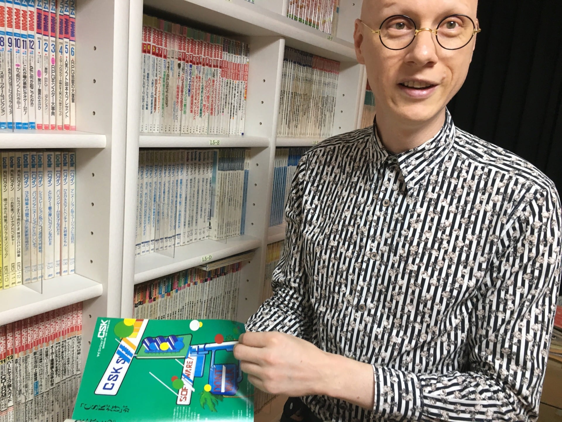 Joseph Redon with the Society’s library of vintage PC gaming magazines.