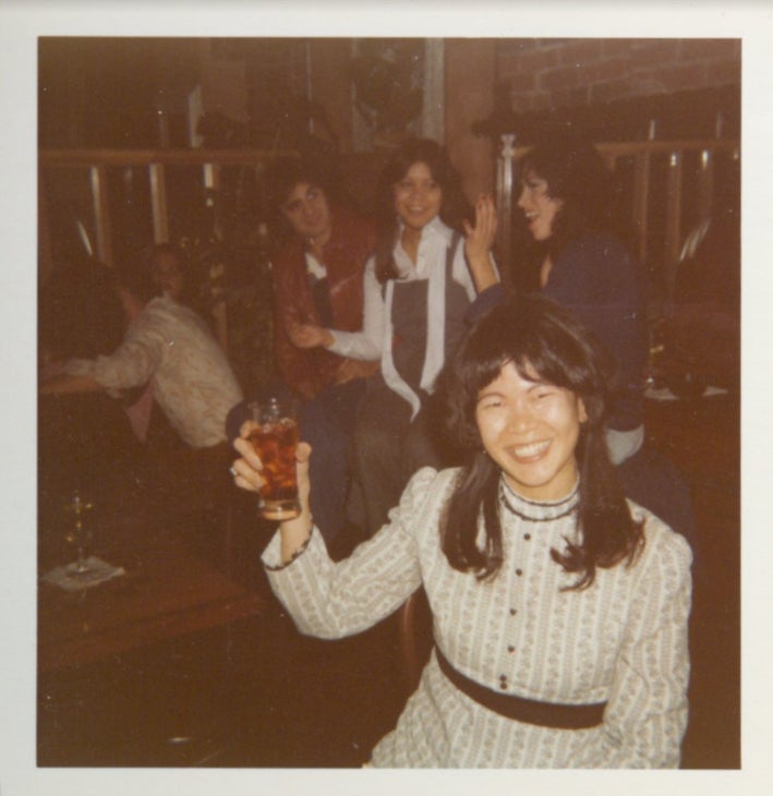 Wanda Hill raising a glass at an Atari social event. Photo courtesy of Wanda Hill.