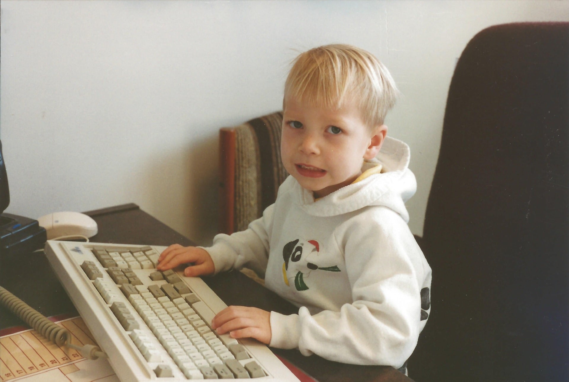Young Cam playing on a computer
