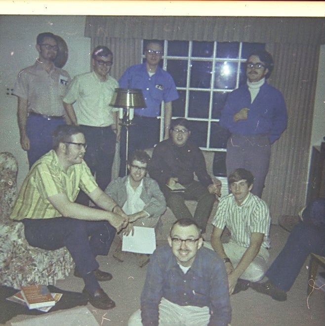 Dave Arneson’s Basement circa 1971. Dave Arneson’s role-playing group, consisting of Bill Hoyt, Duane Jenkins, Pete Gaylord, David Megarry et al. Photo by Arneson. 