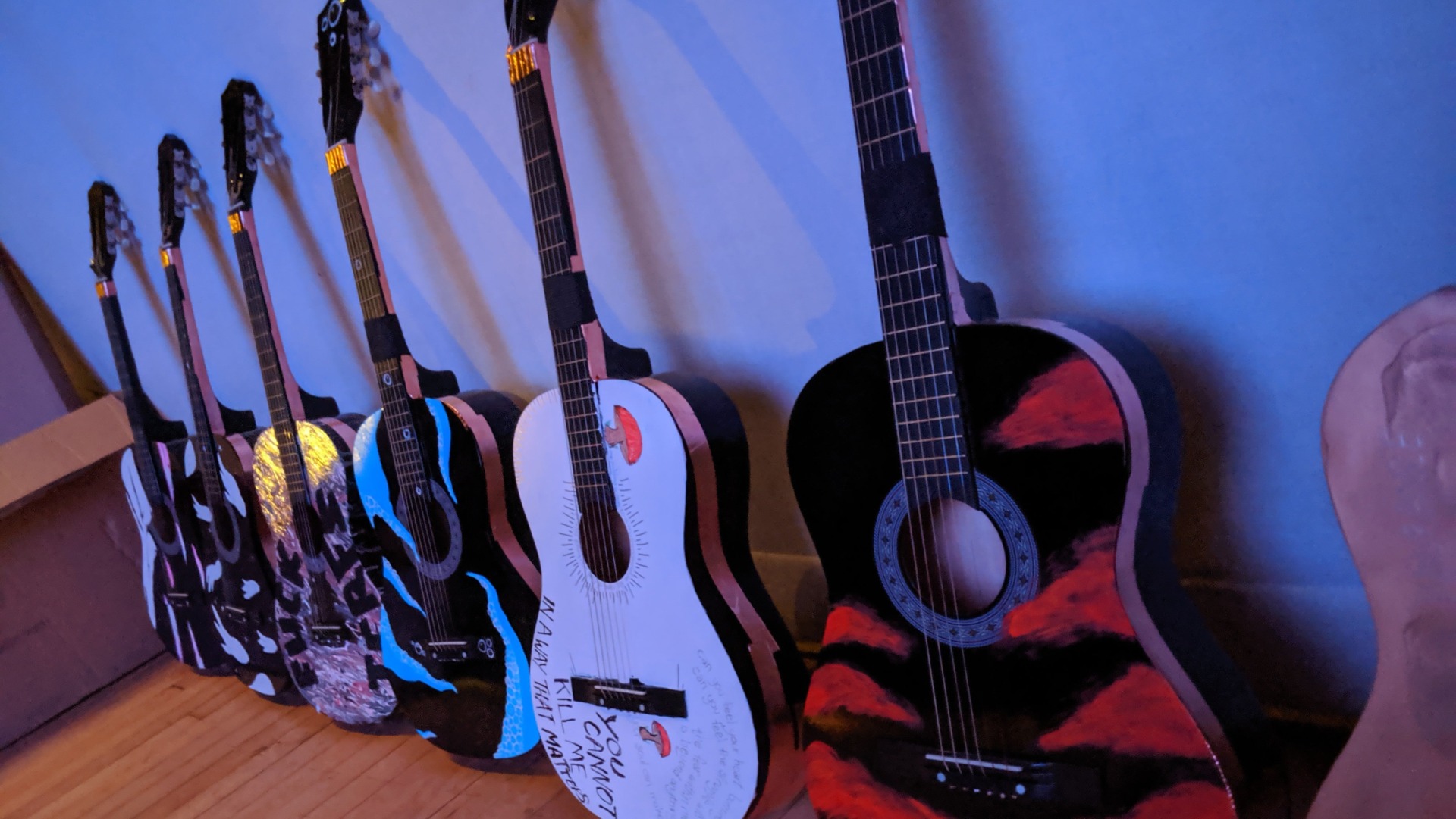 Guitar controllers customized by Amanda and Amy Hudgins.