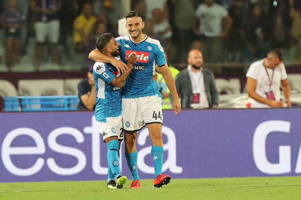 Napoli’s Lorenzo Insigne (L) and Kostas Manolas (R)