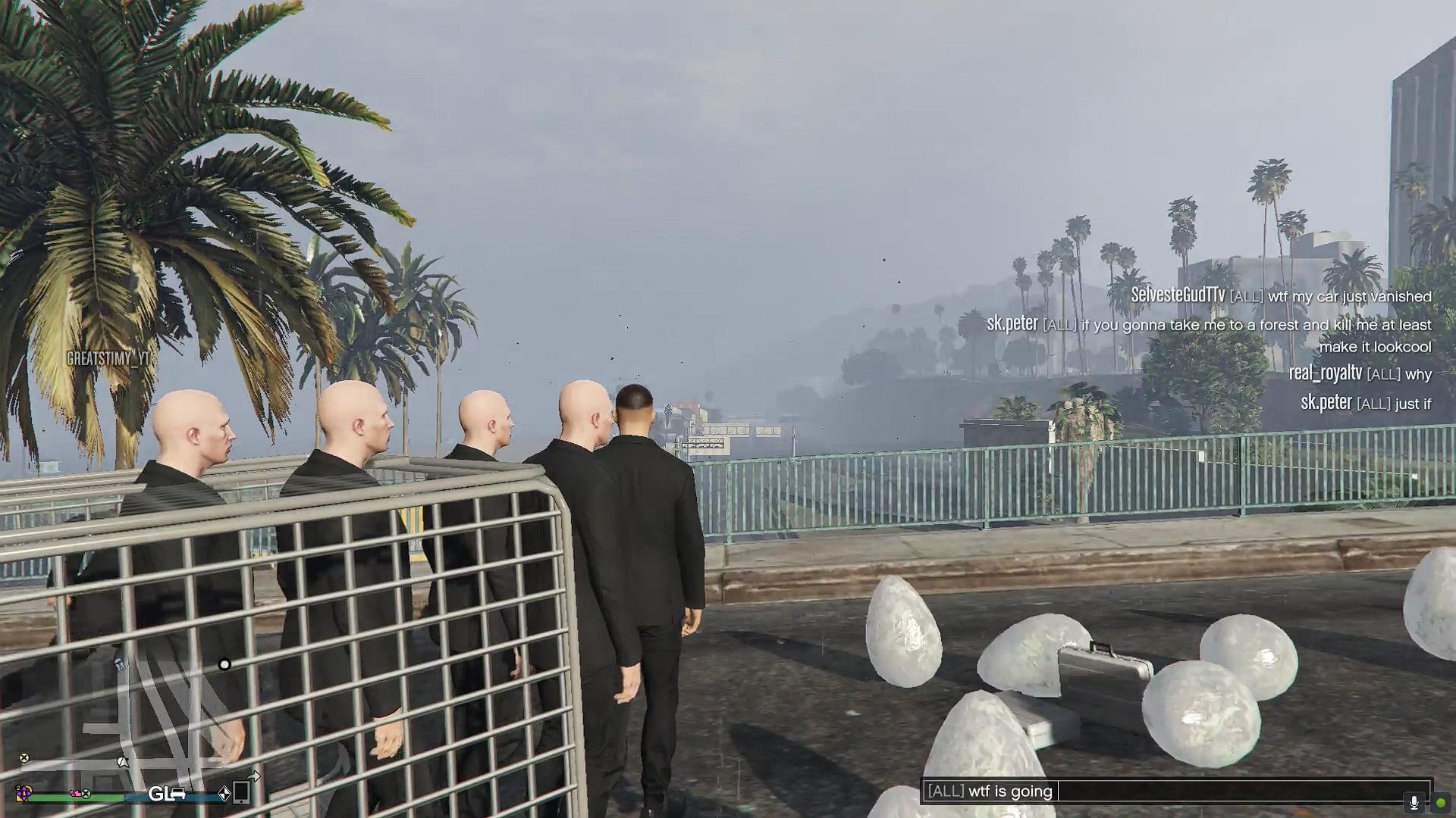 Random items and NPCs spawned right on top of a player in a GTA Online lobby.Â