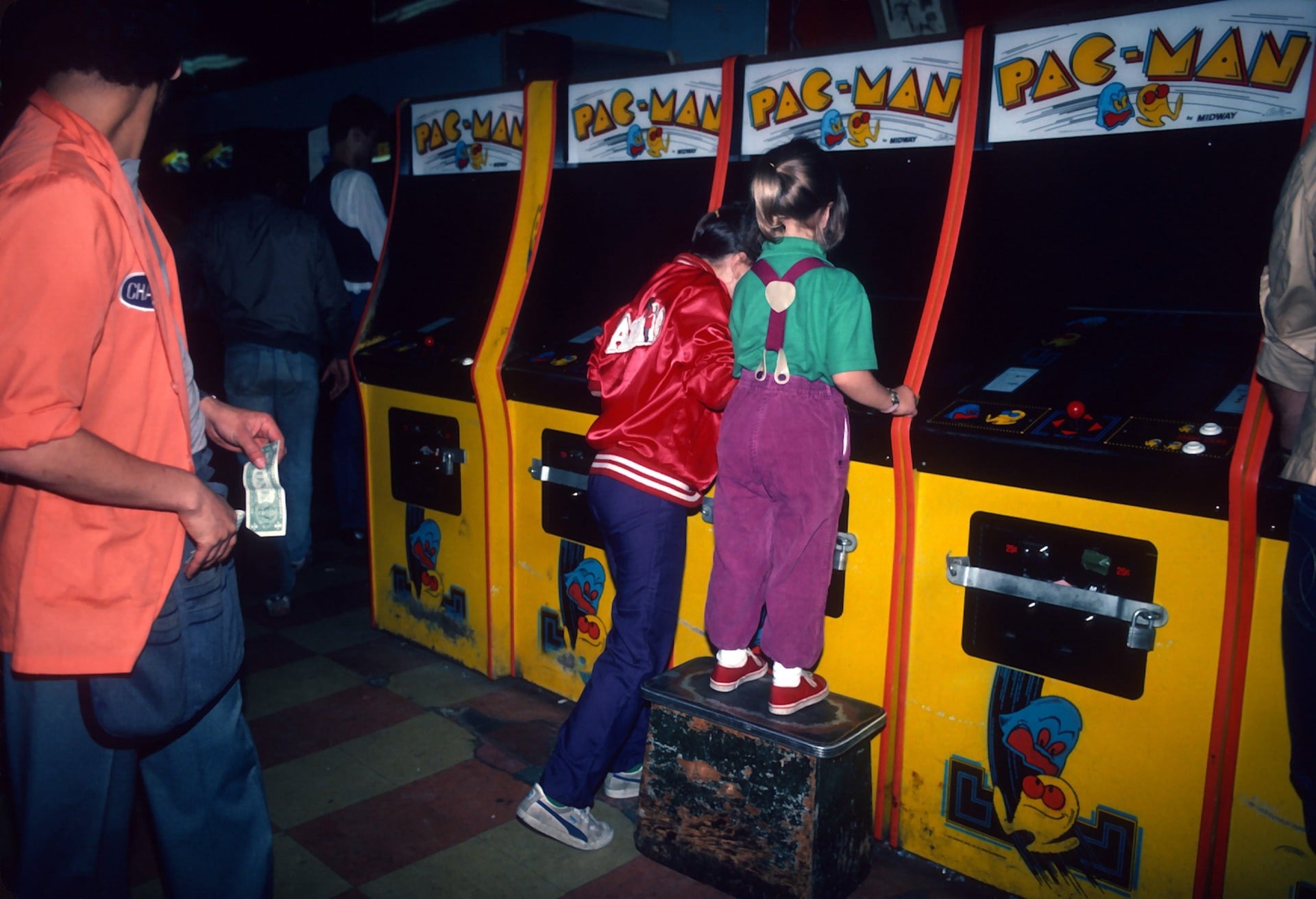 Two girls play Pac-Man in a Times Square arcade on June 1, 1982.