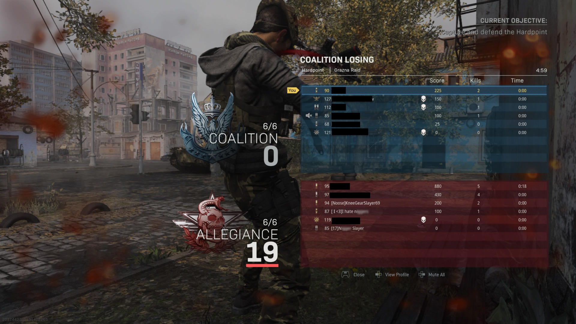 A screenshot of a Call of Duty match showing players with racial slurs in their display names. (Names without slurs have been redacted for the players’ privacy.)