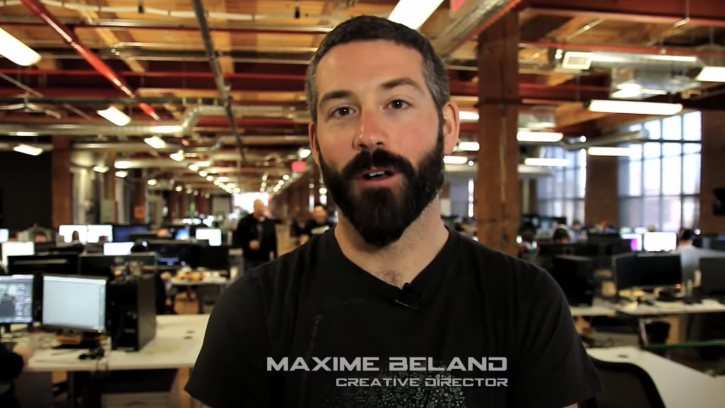 Maxime Béland at the Ubisoft Toronto studio in 2013 giving an interview about Tom Clancy’s Splinter Cell: Blacklist