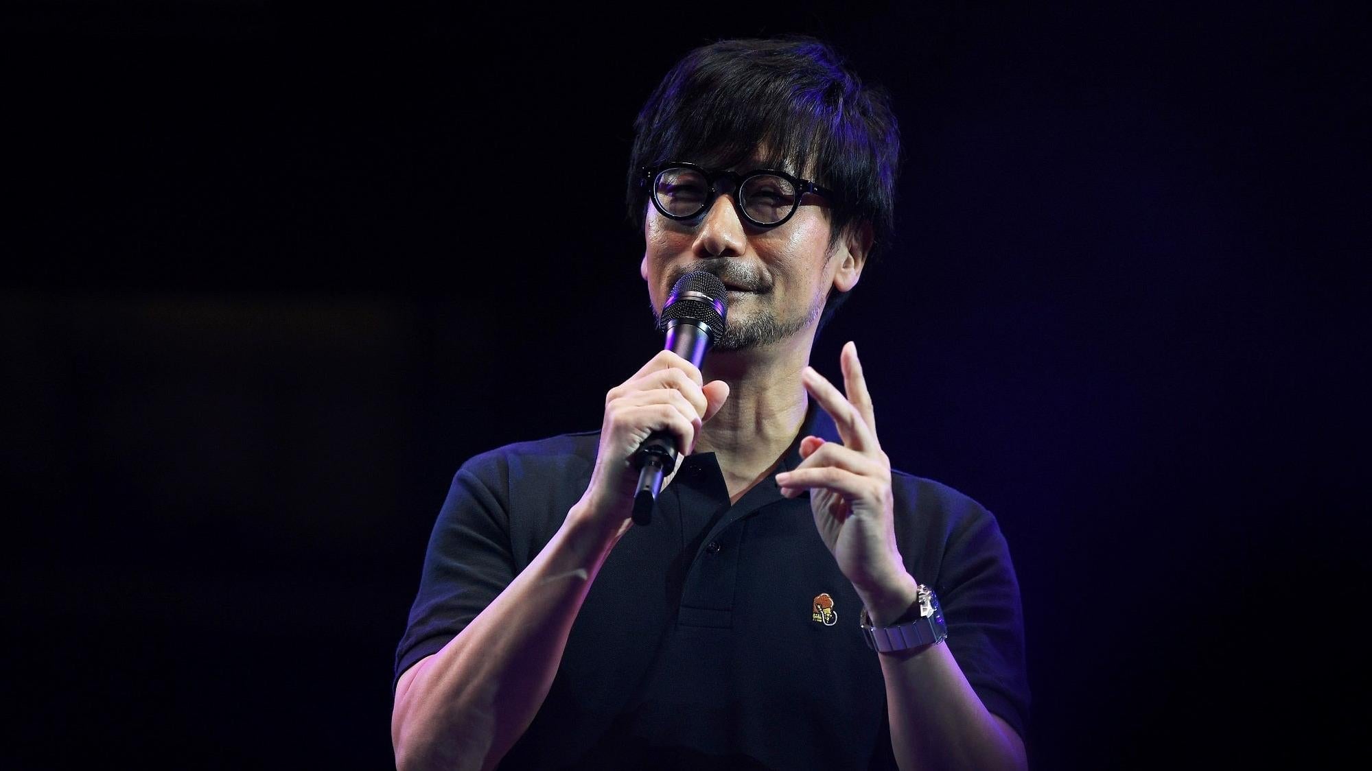 Hideo Kojima appears on stage.