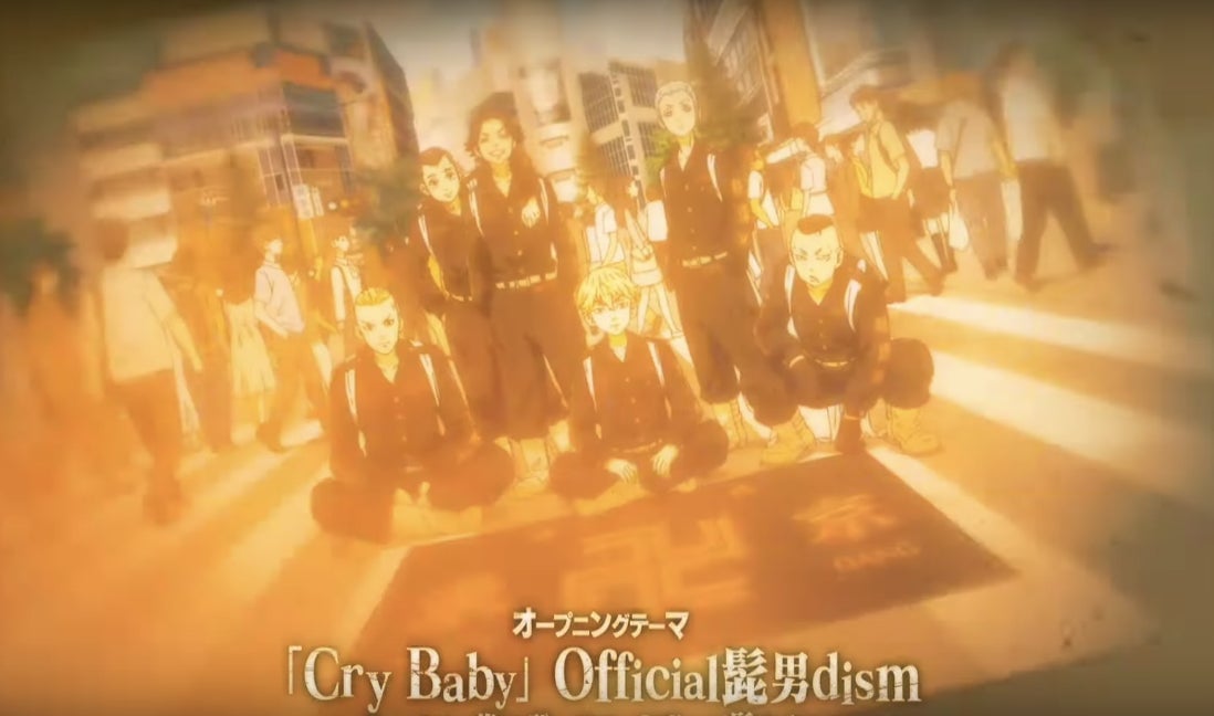 The manji can be seen on the flag spread out on the ground.