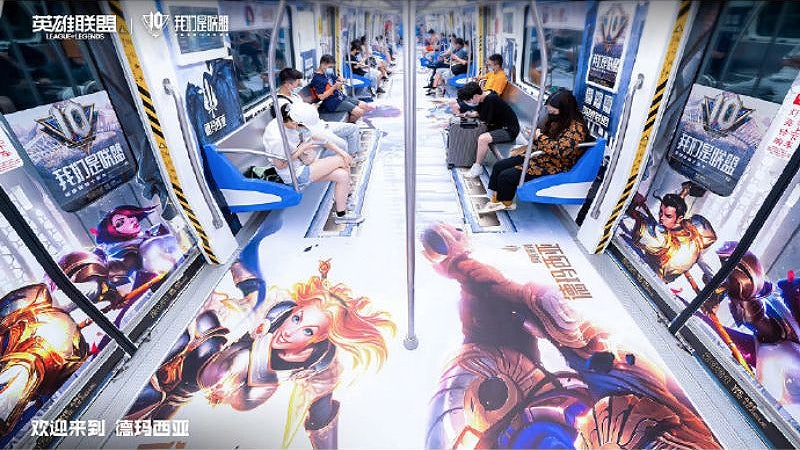 Everyone everywhere usually stares at their phones while taking the train. But why not soak up all the atmosphere of the LoL subway car? 