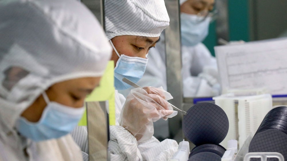 Employees at Jiejie Semiconductor Company in Nantong, China making chips this past March.
