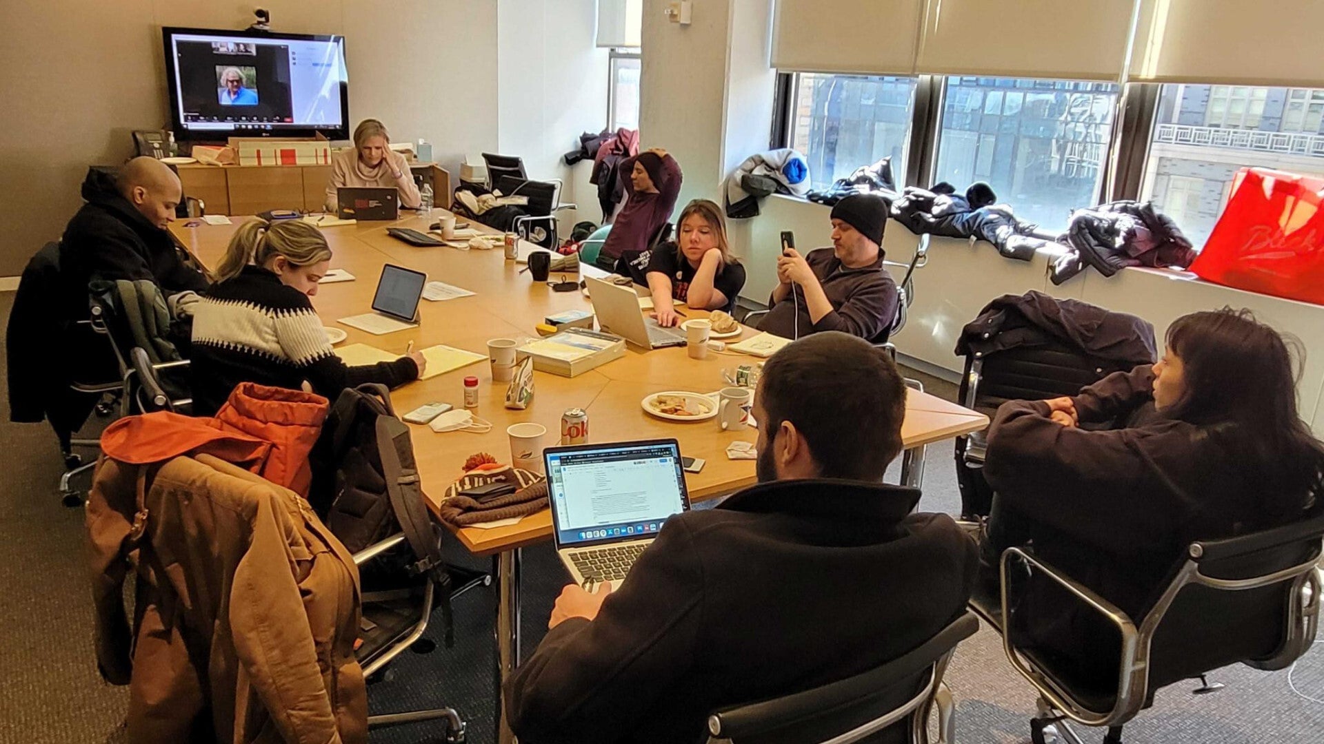 Called away from the rally, the GMG bargaining committee gathered at the offices of the Writers Guild of America, East, alongside teleconferenced colleagues, for a sudden bargaining session that lasted into the next morning.