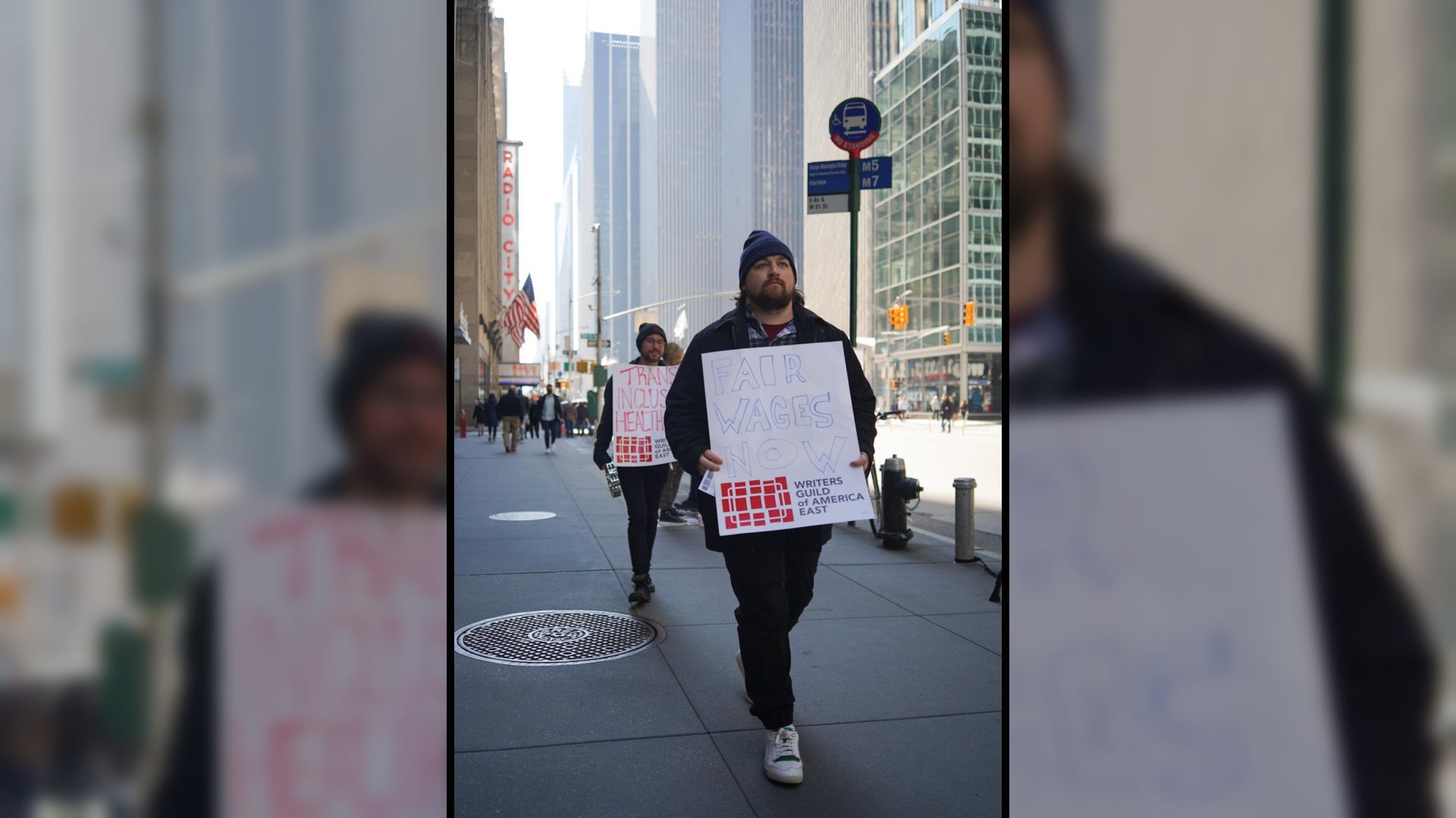 Beating the pavement day after day is a tiring but essential part of a strike. Repping here are social media specialist Jeb Biggart and previous Kotaku editor-at-large Riley McLeod.
