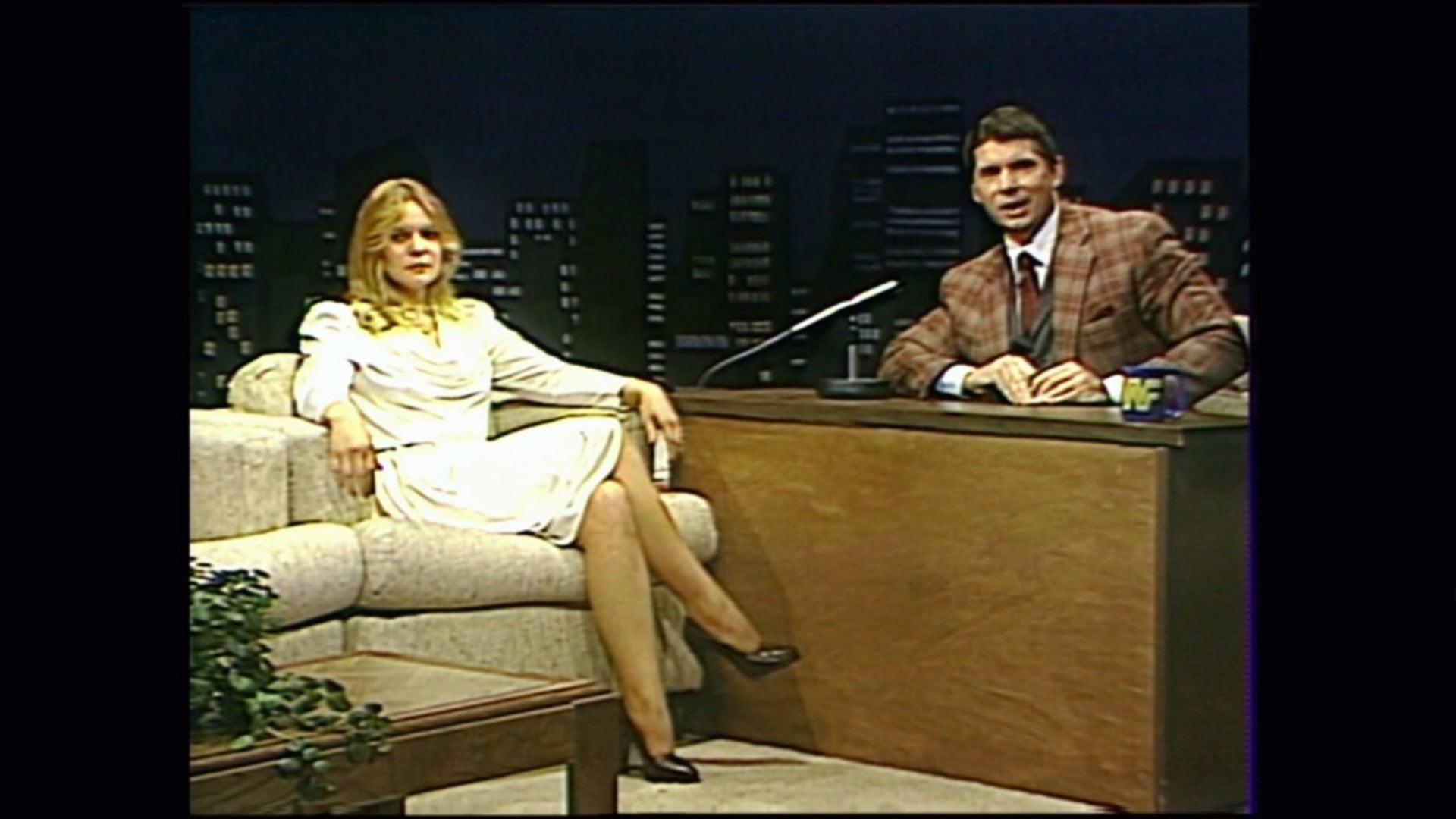 Vince McMahon interviewing Rita Chatterton on the professional wrestling talk show, Tuesday Night Titans