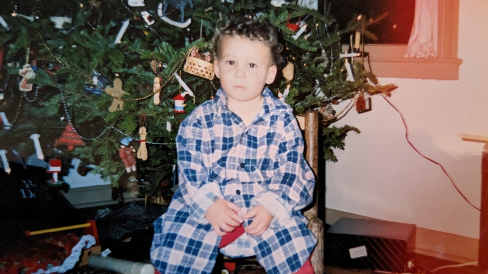 Baby Ethan Gach, just after a phone call with a source (Santa).