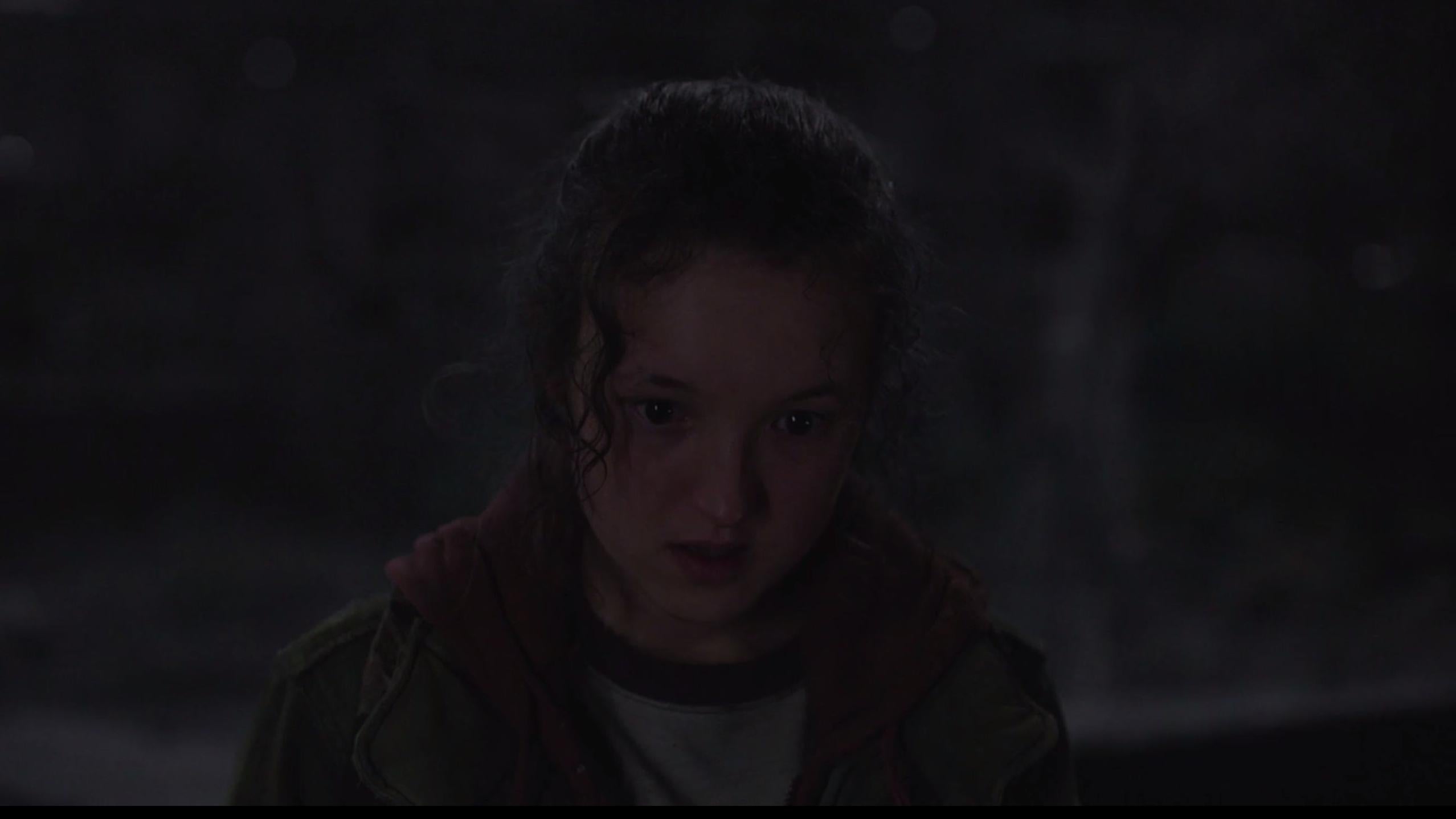 Ellie looks on with something like awe as Joel beats a man to death.