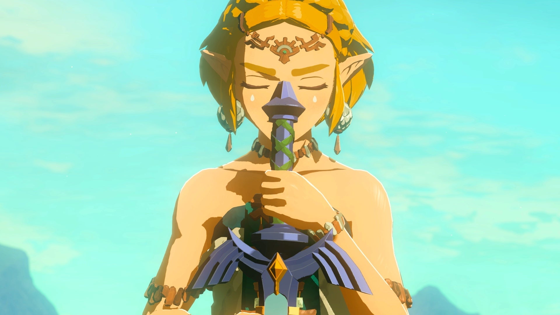 Zelda holds up the Master Sword.
