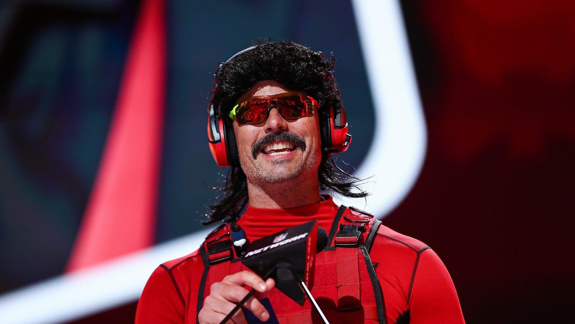 Dr Disrespect appears on stage during the 2022 NFL Draft.