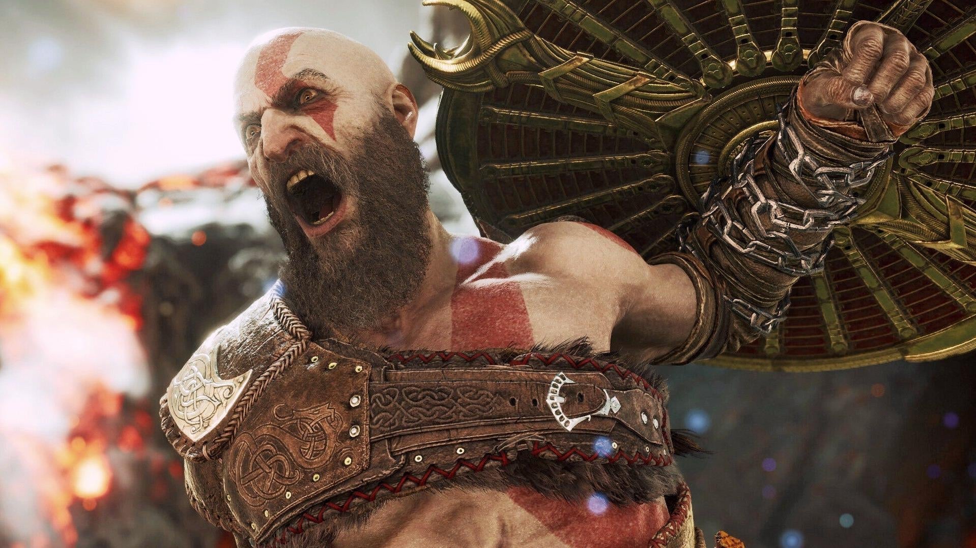 Kratos raises his shield.