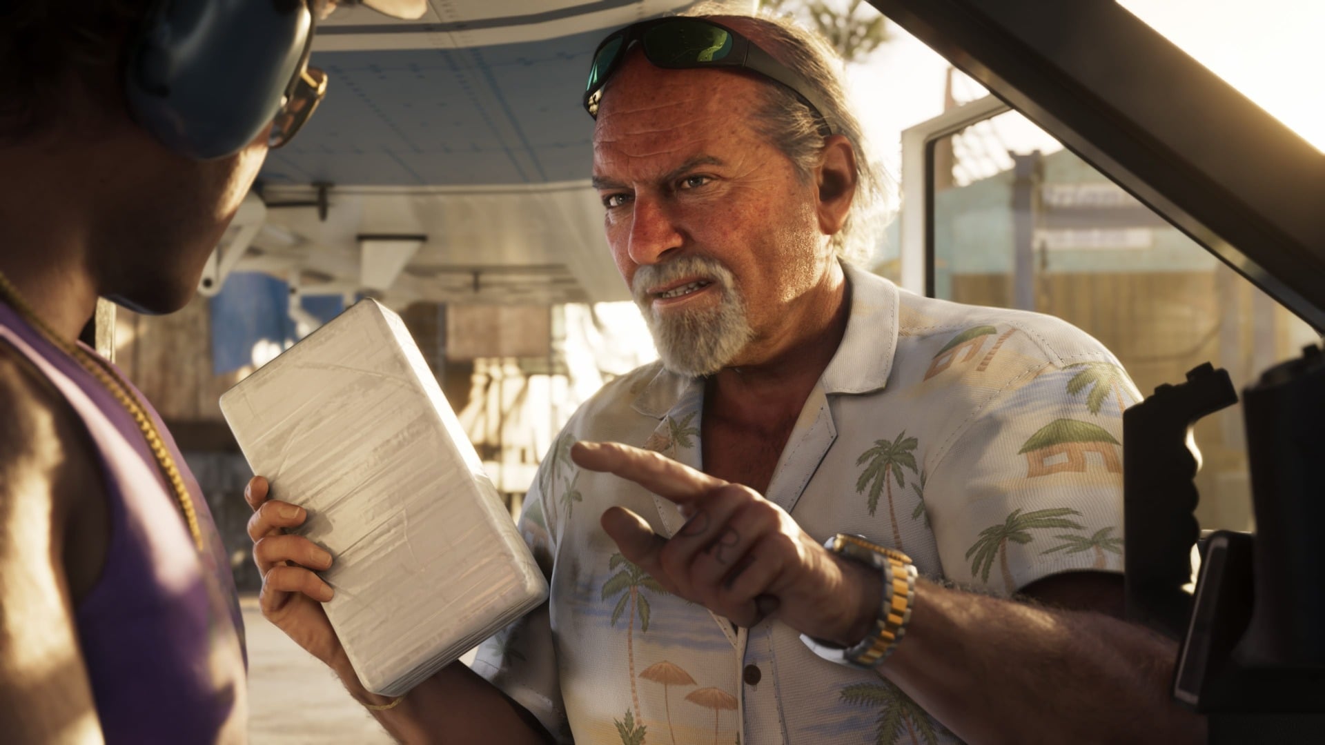 A man points his finger menacingly while holding a paper.