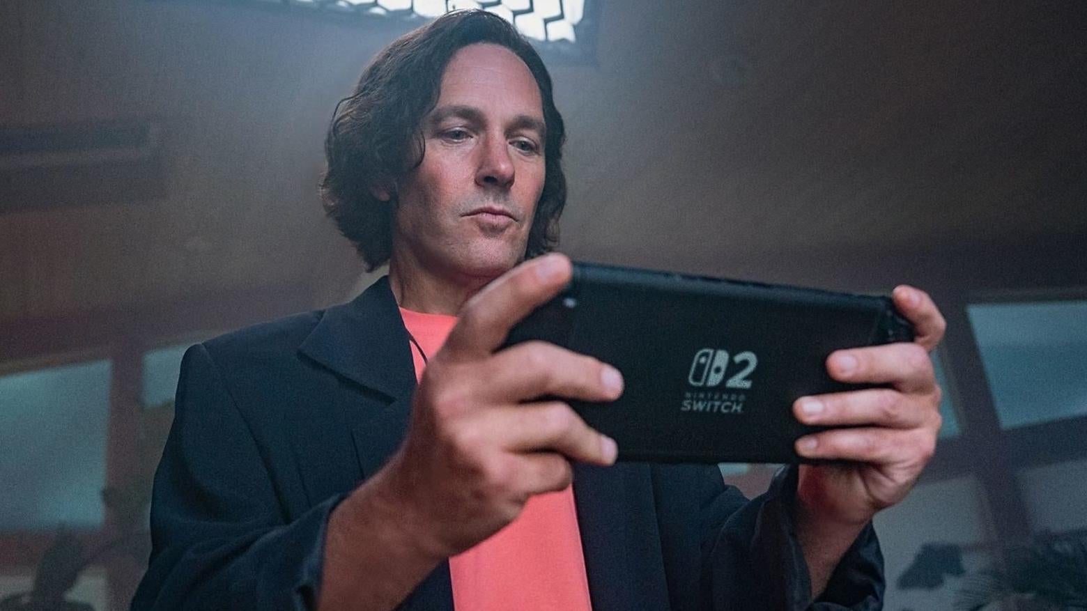 A famous actor holds a Switch 2.