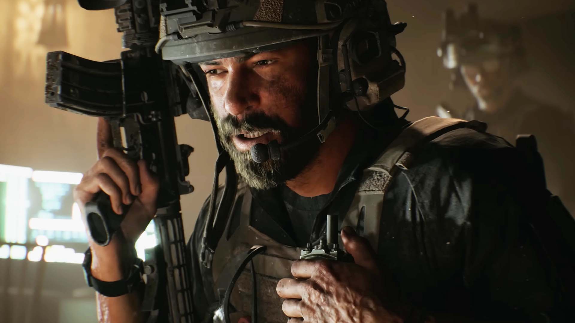 An operative clutches a walkie talkie.