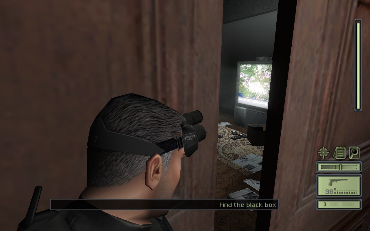 Sam Fisher cracks a door open to peak inside.