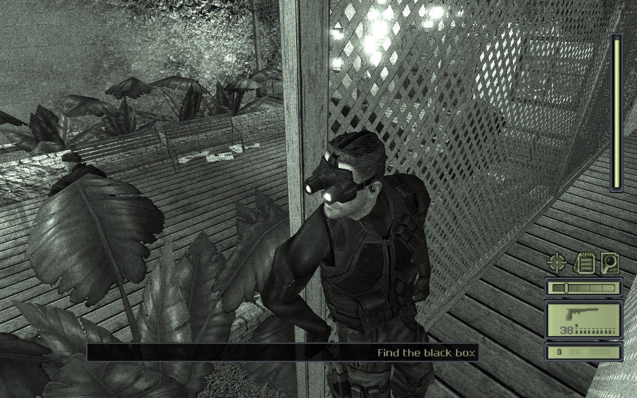 Sam Fisher looks around the corner at an enemy while wearing night vision.