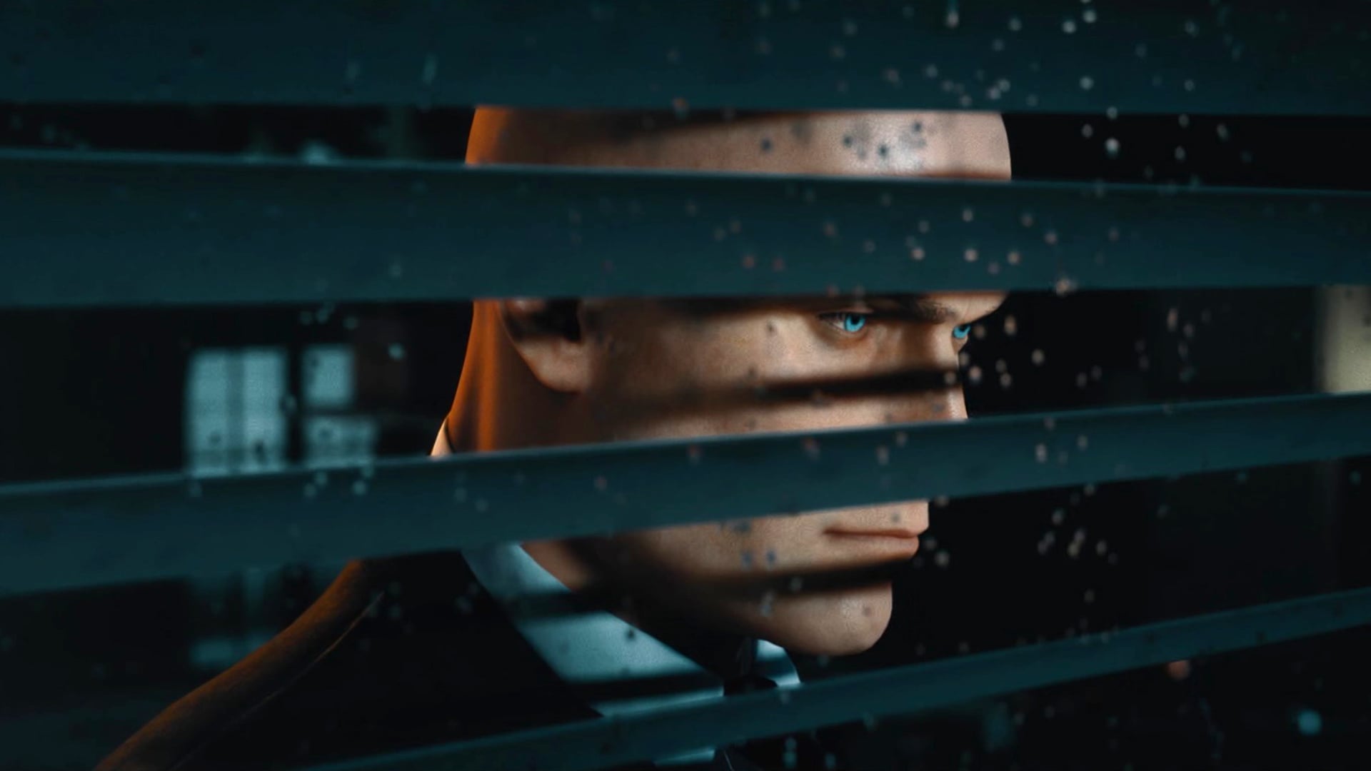 Agent 47 peers through window blinders at his target.