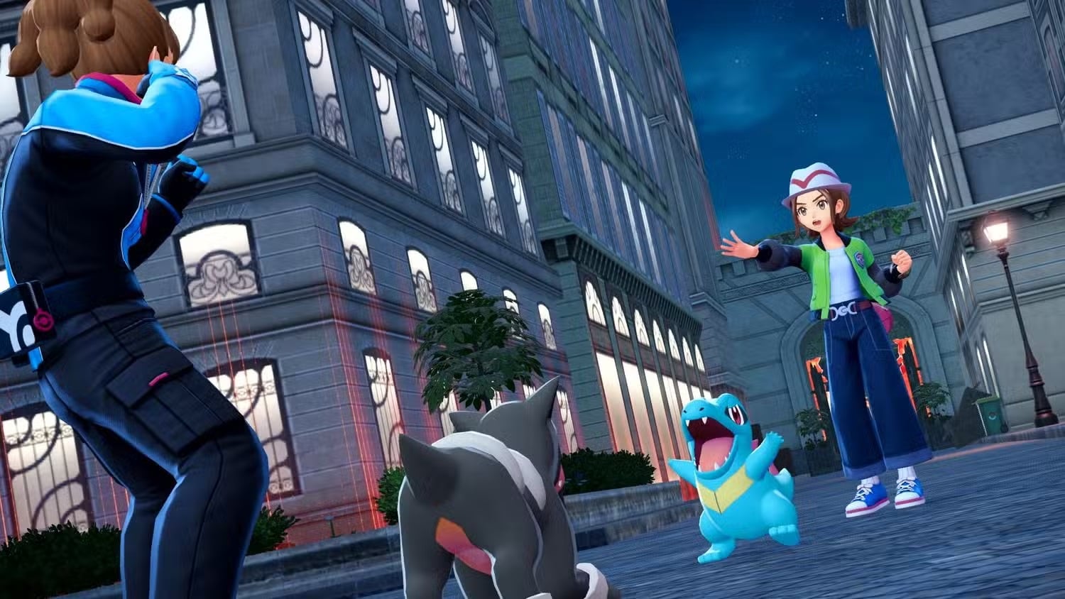 Pokemon fight on the streets at night.