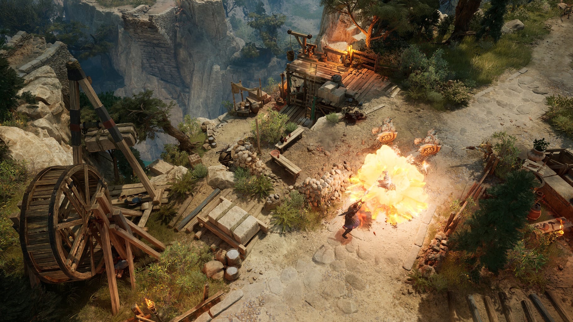 An explosion in the middle of a path, near a broken wheel.