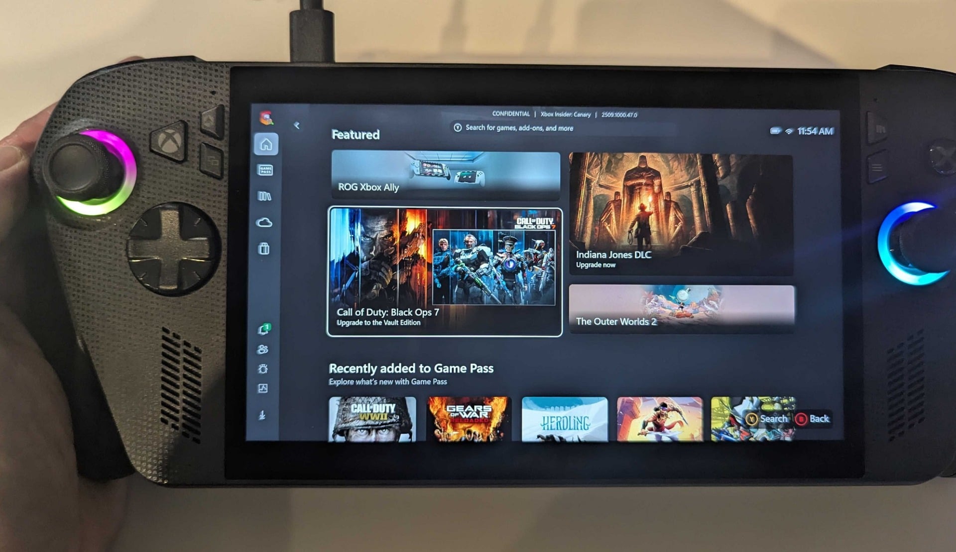 The ROG Xbox Ally X appears on a table.