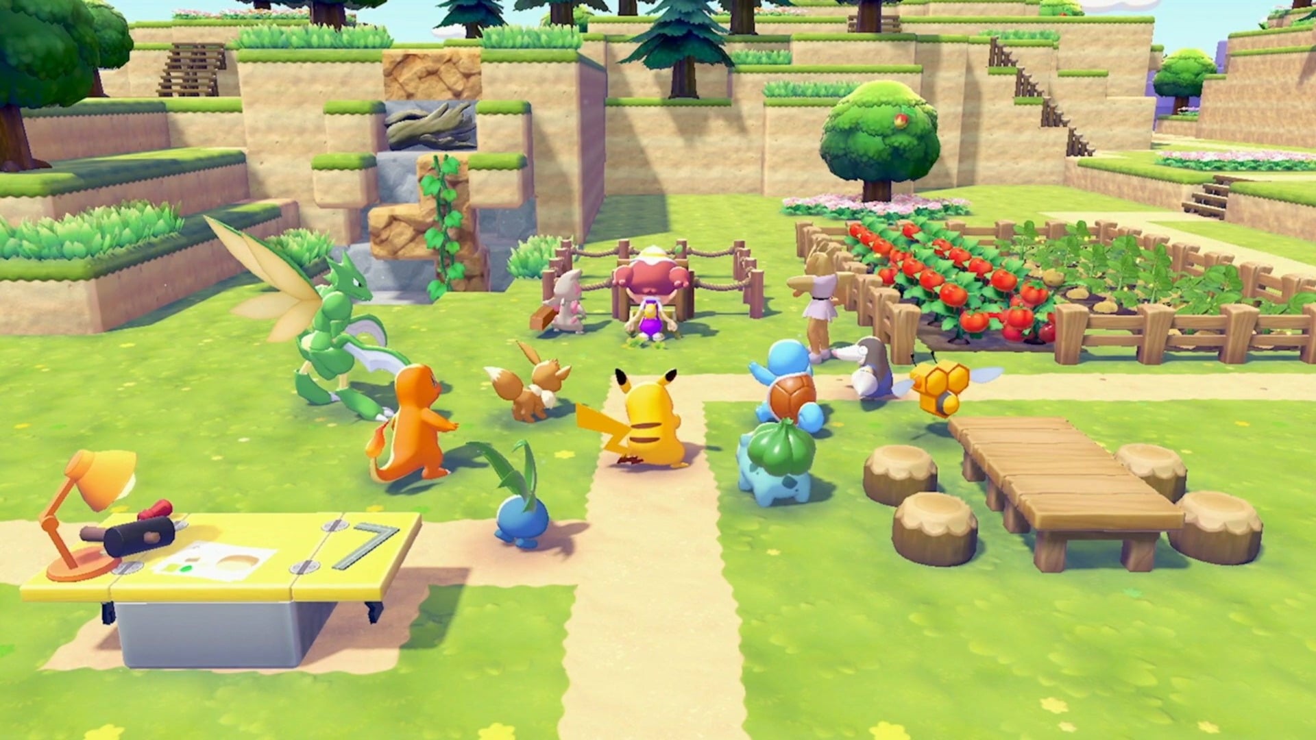 A group of Pokemon gather around a garden area