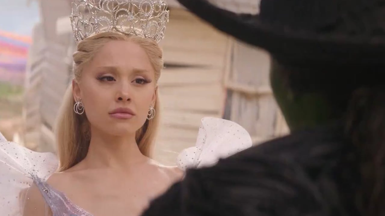 Glinda stares at Elphaba.