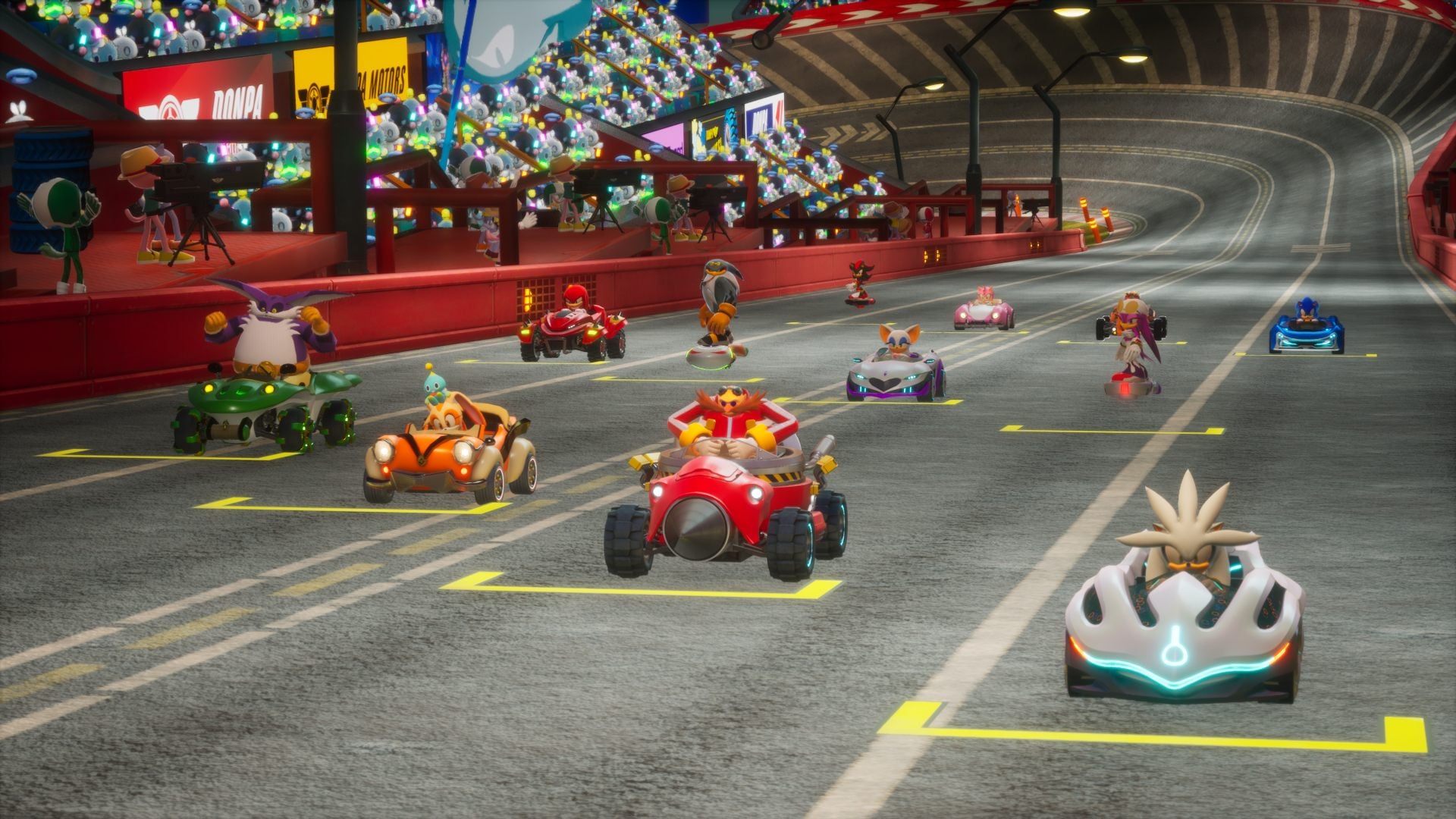 The beginning of a Crossworlds race shows racers lined up in their karts and boards.