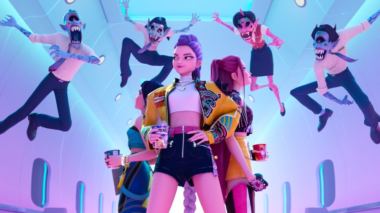 Huntr/x stands back to back as a group of demons pounce above them.