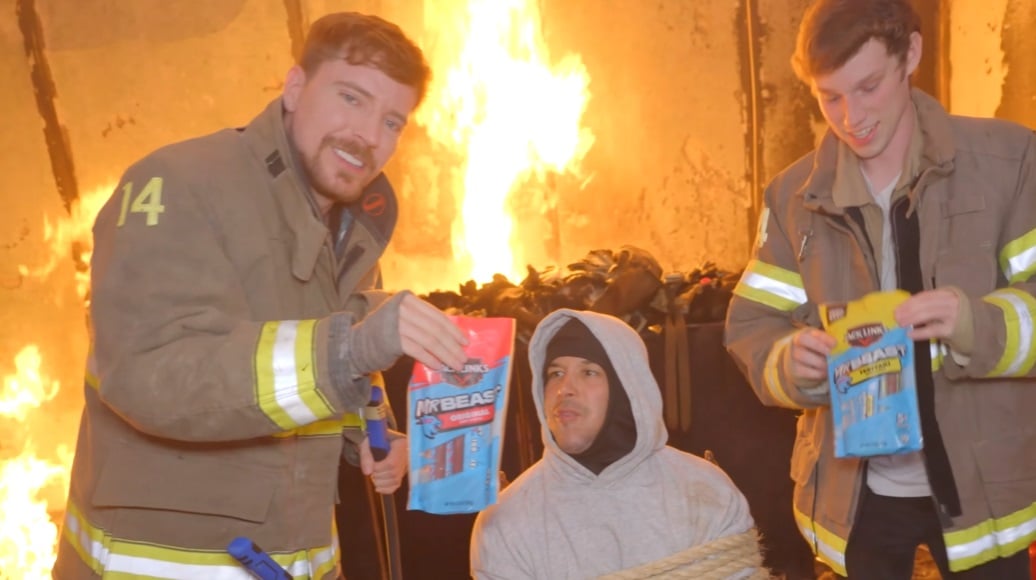 Mrbeast hold up his product during a YouTube video.