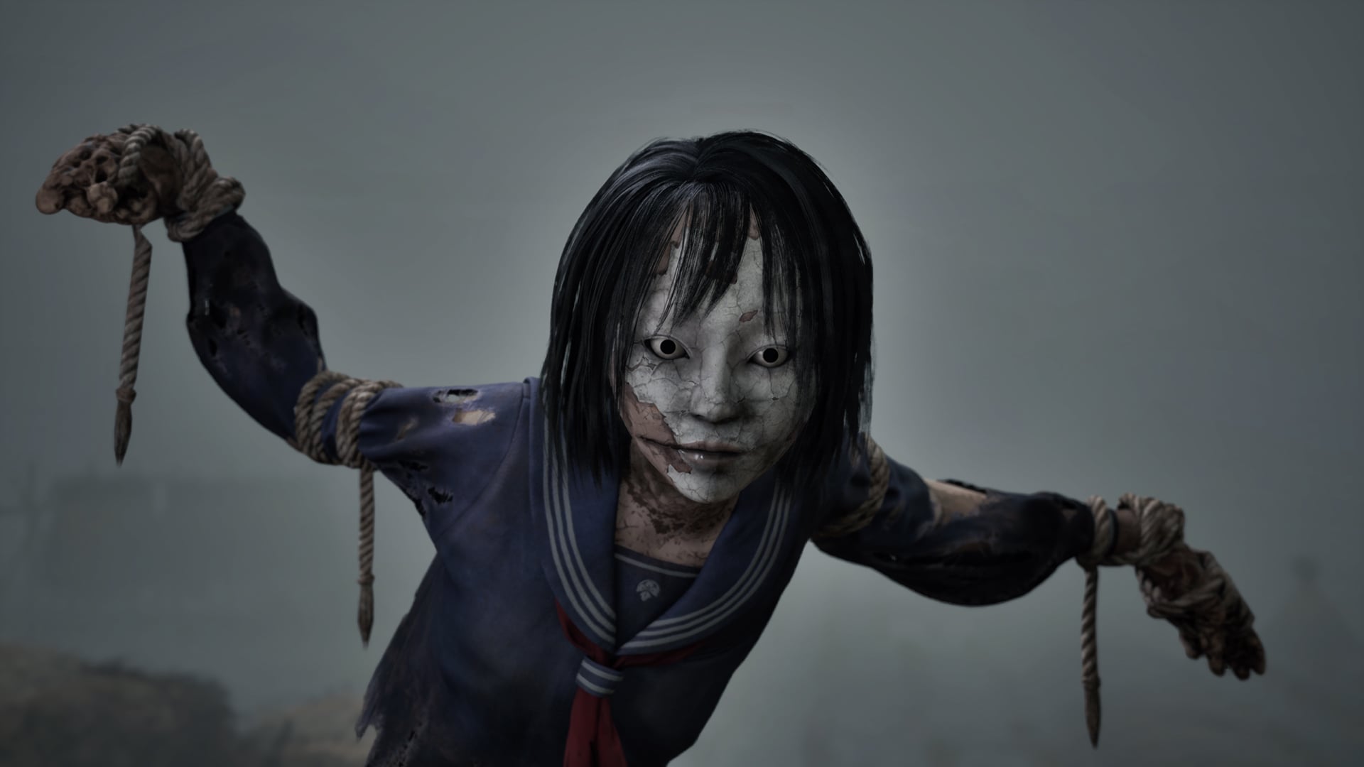 A scarecrow dressed as a school girl stares into the camera.