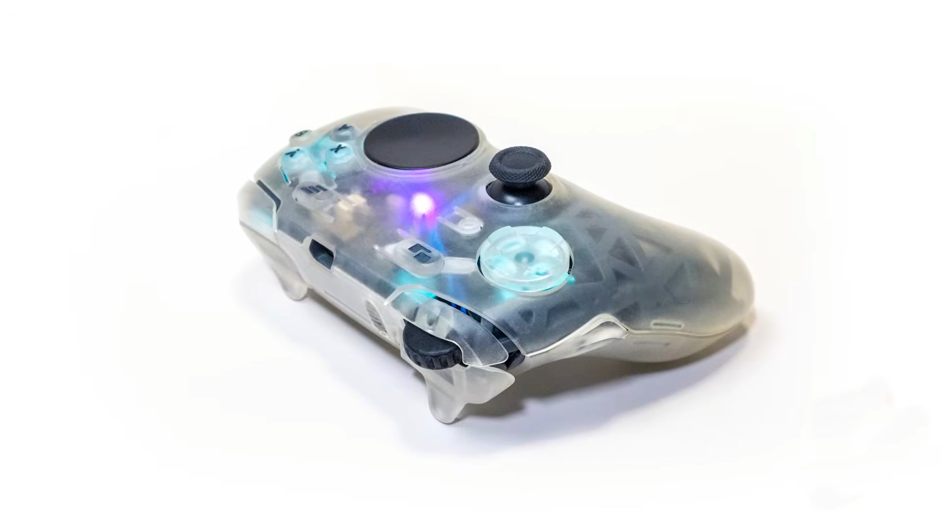 A DIY controller with a touchpad and mousewheel sits on a white backdrop.