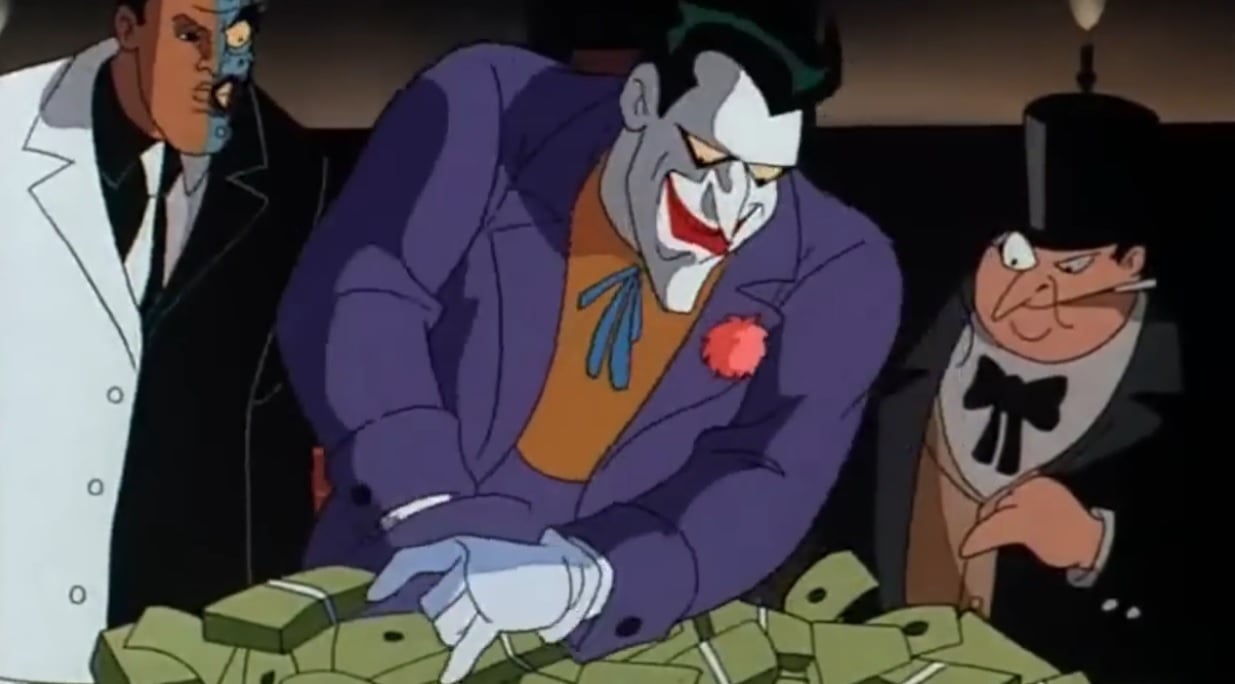 The Joker puts all his cash on the table.