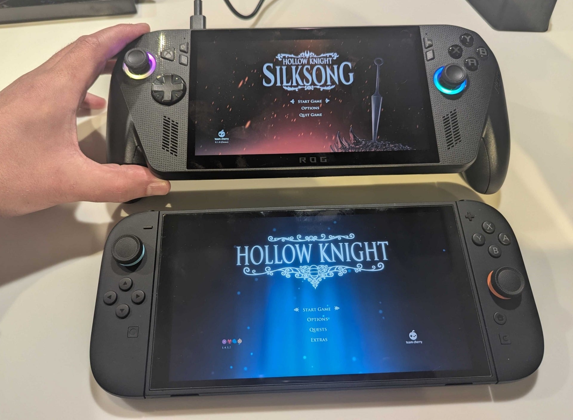 An Xbox Ally and Switch 2 both display Hollow Knight.