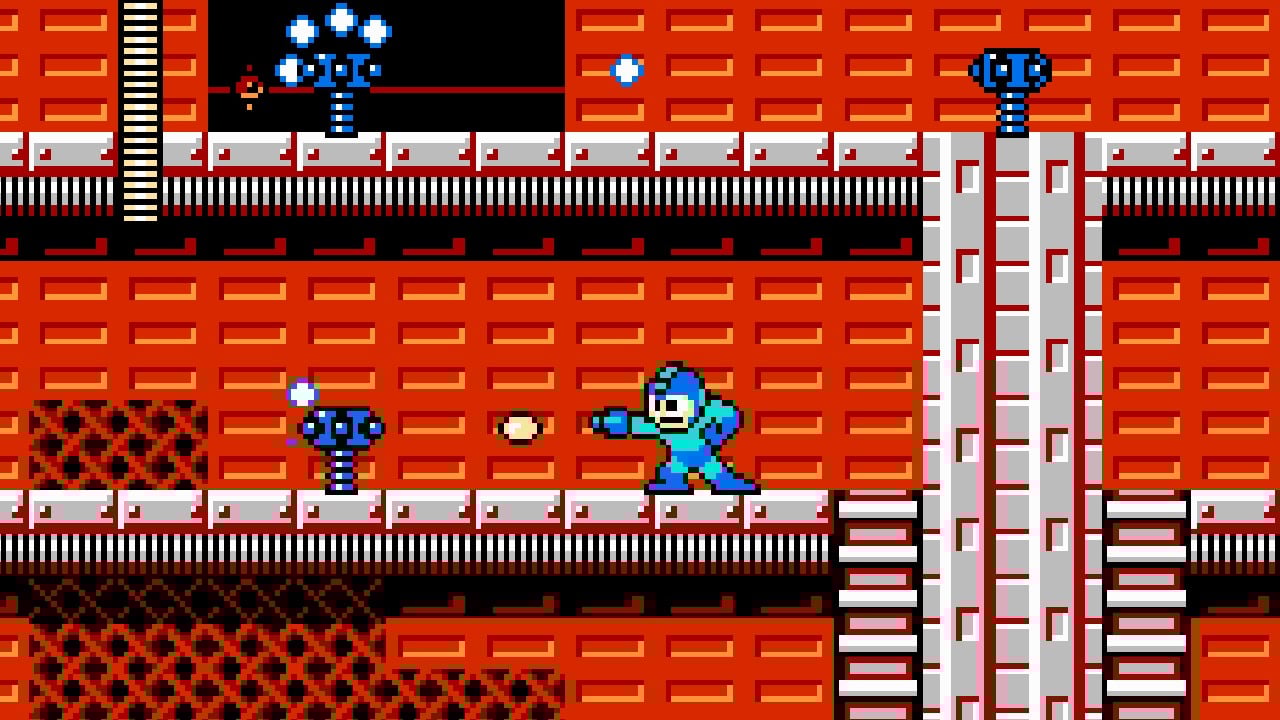Mega Man against a red brick wall.