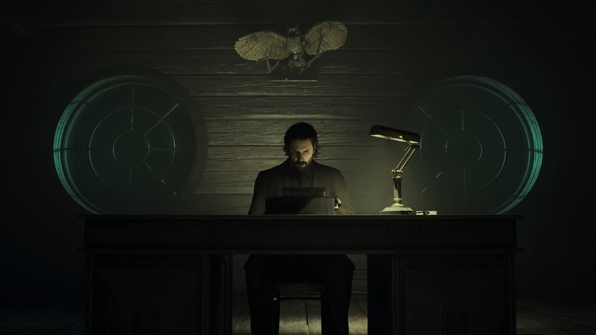 Alan Wake sits at a typewriter.