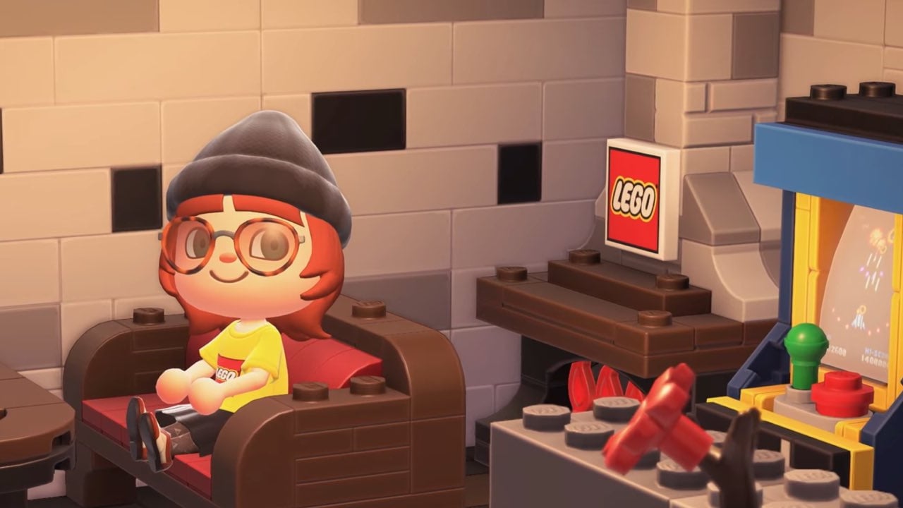 An Animal Crossing character sitting on a Lego couch.