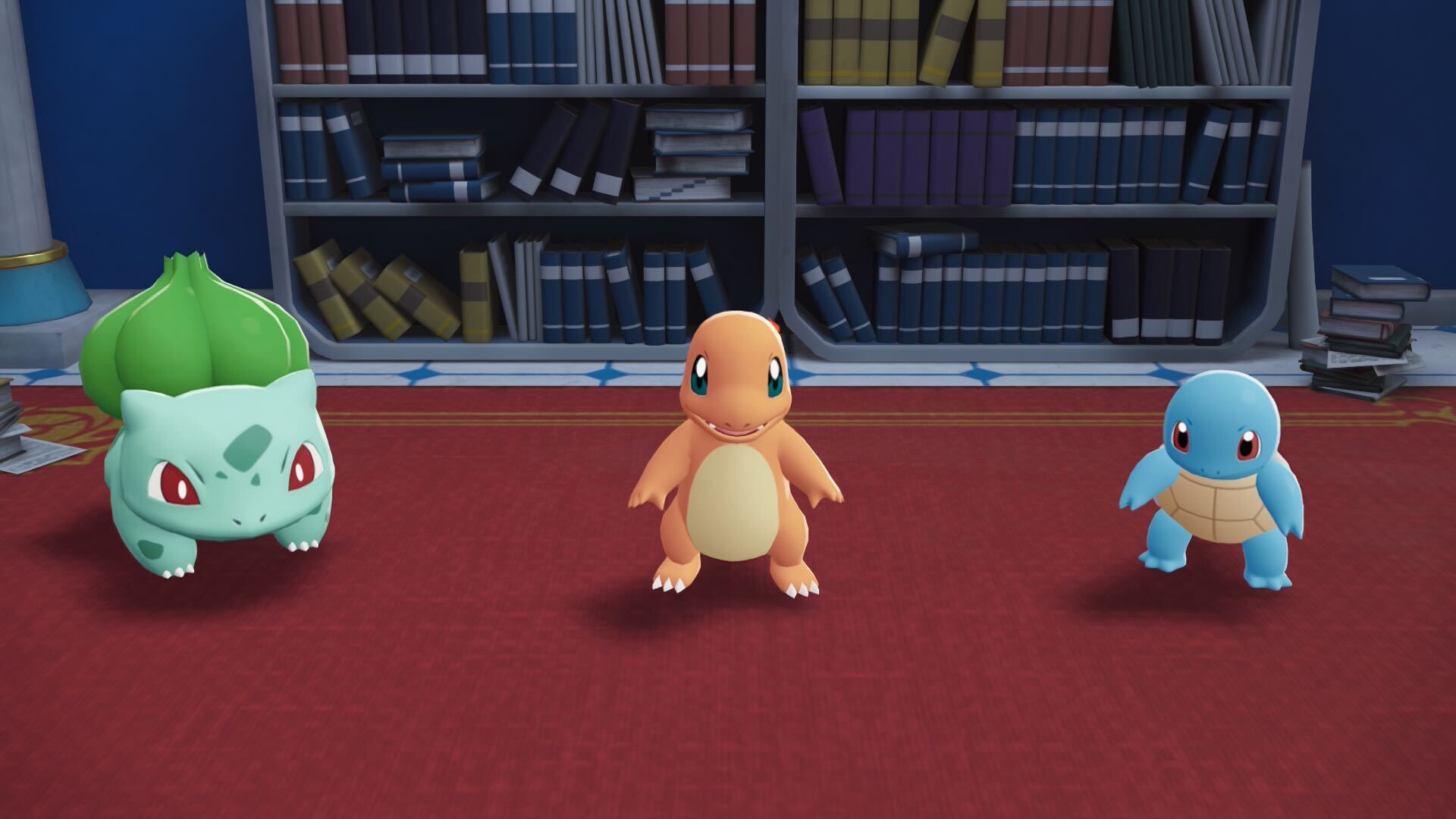 Bulbasaur, Charmander, and Squirtle lined up in a row.