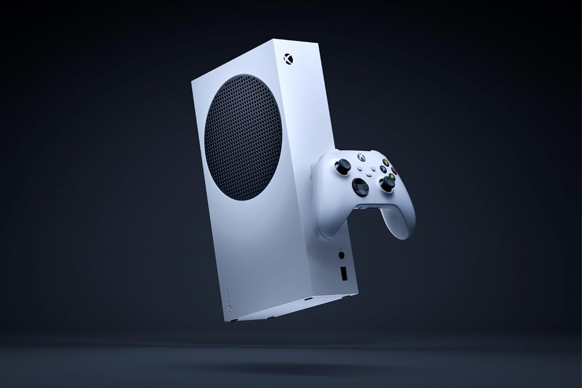 An Xbox Series S hangs in the air.